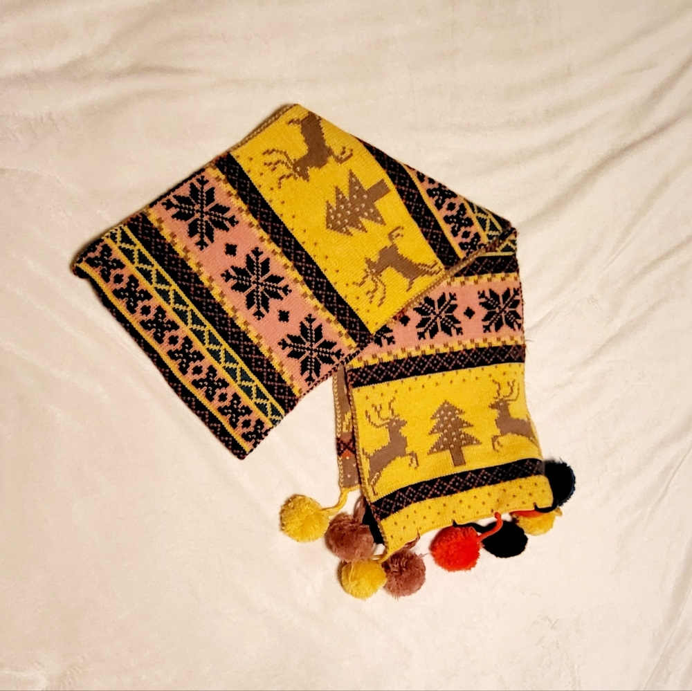 Colorful winter scarf, reindeer, trees, vibrant.